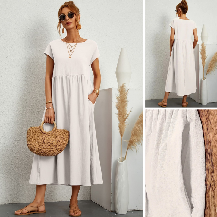 Women's short sleeve loose fit maxi dress, round neck, with handy pockets, great for summer style.