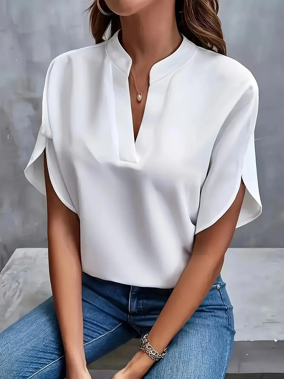 Elegant women's V-neck blouse, short sleeve, loose fit. Versatile for office wear, casual, or spring fashion.