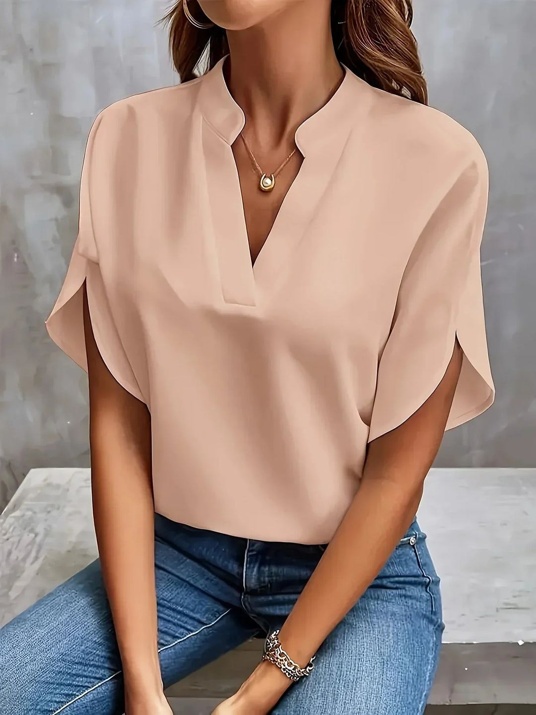 Comfortable women's loose fit V-neck tunic blouse, short sleeve, perfect for relaxed summer days.