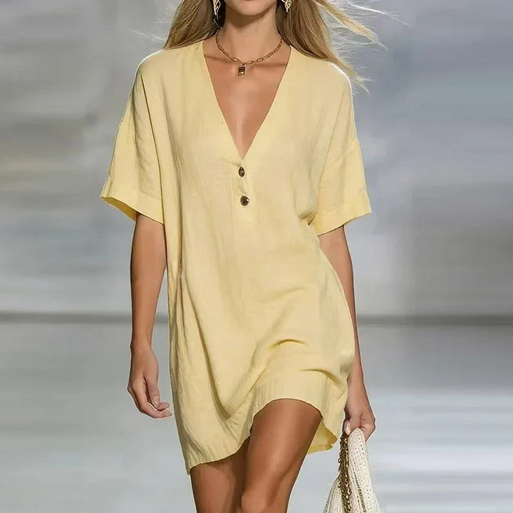 Women's loose fit V-neck shirt dress, perfect casual summer beachwear with buttons, relaxed style.