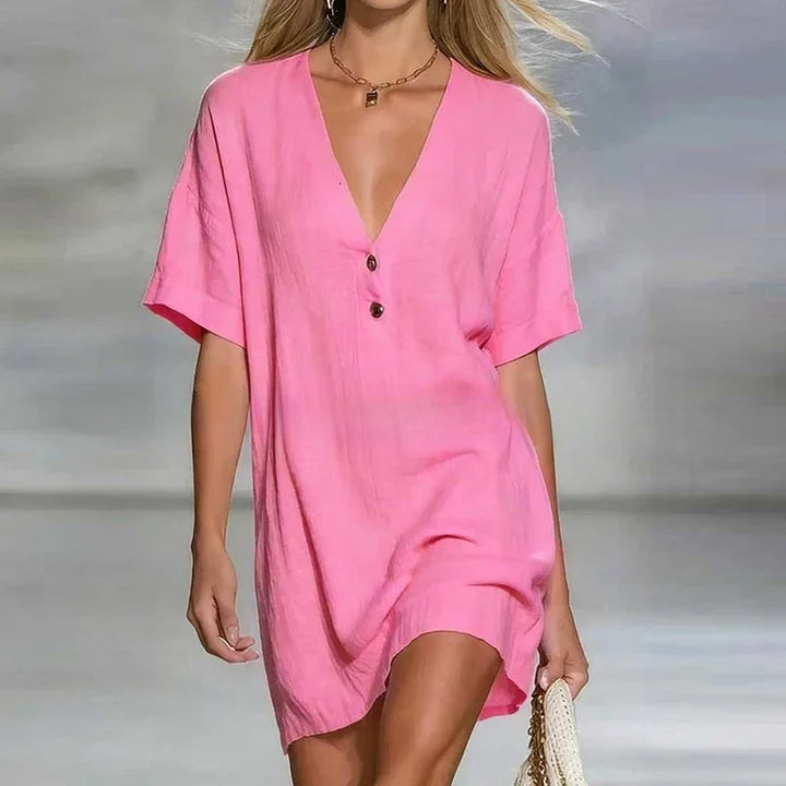 Soft, breathable fabric of a women's V-neck shirt dress, ideal for casual summer everyday wear.