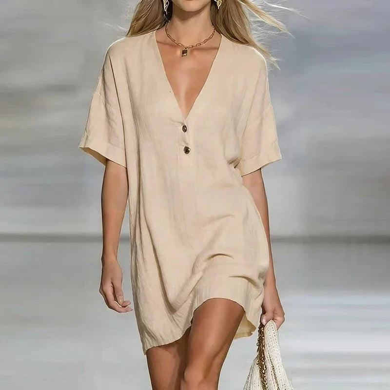 Stylish women's V-neck shirt dress, a versatile loose fit for casual summer, beach or everyday wear.