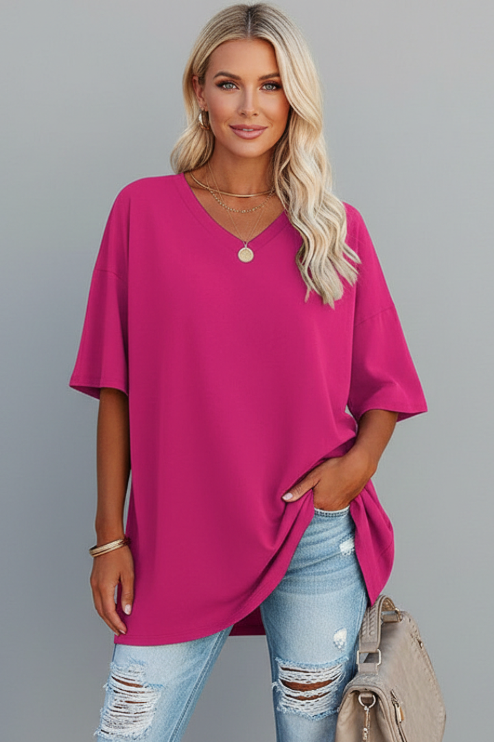 Plain women's V-neck tee, relaxed fit, dropped shoulder. Perfect for everyday comfortable style.