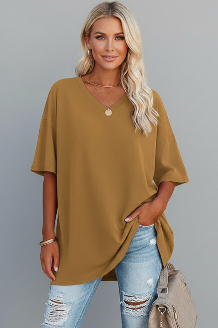 Casual women's short sleeve V-neck top. Loose fit and comfortable for versatile everyday wear.