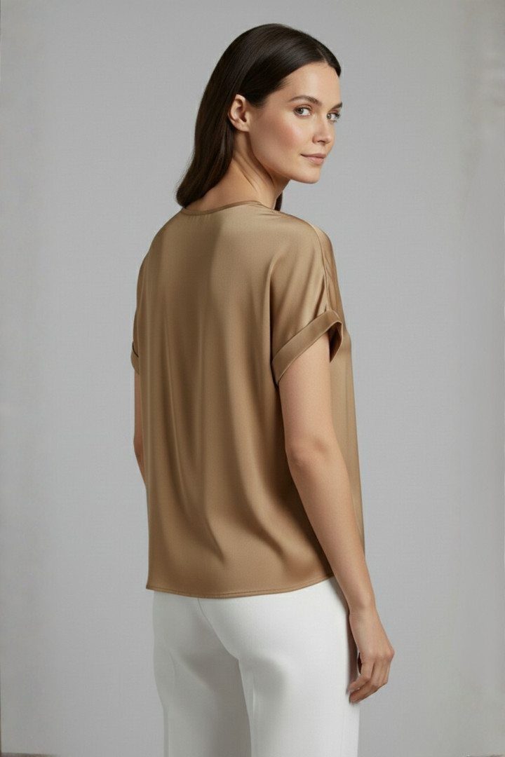 Women's loose fit V-neck top, short sleeve and comfortable. Great for casual summer fashion.