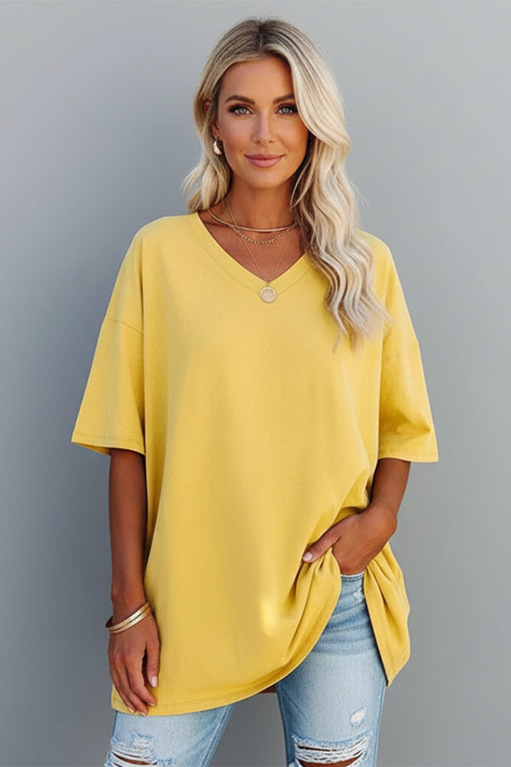 Stylish women's V-neck tee with dropped shoulder detail. Perfect plain top for relaxed summer comfort.