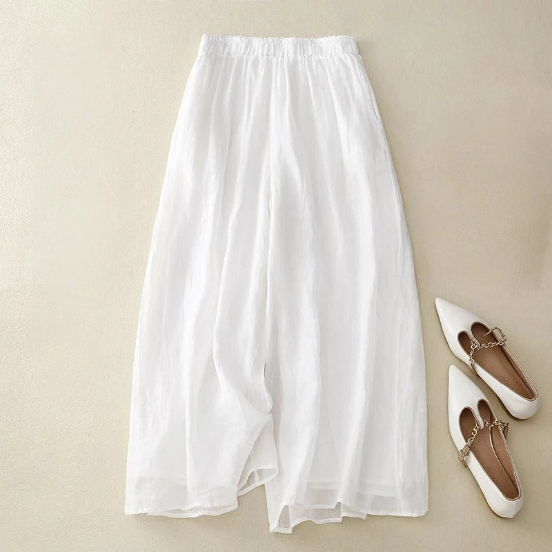 Versatile women's loose pants, relaxed fit waistband trousers. Comfortable for casual or chic spring/summer fashion.