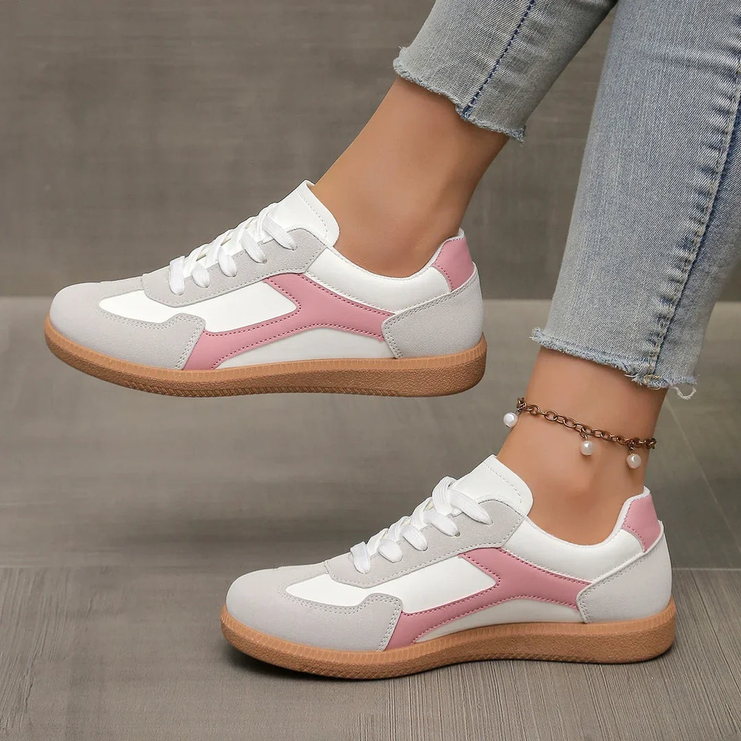 Women's low profile casual sneakers with a classic gum sole, cushioned for everyday comfort.