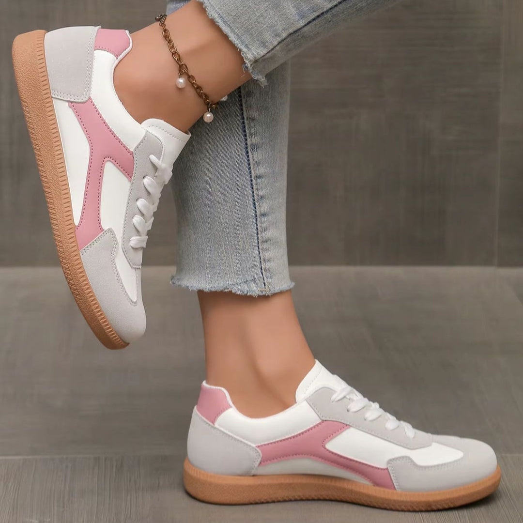 Retro-style women's low-top fashion sneakers, featuring a stylish gum sole for versatile wear.