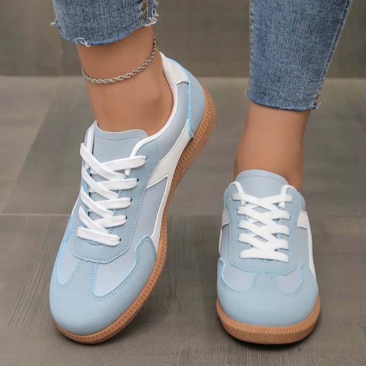 Ladies' versatile low-top sneakers, perfect for everyday wear, with a durable gum sole.