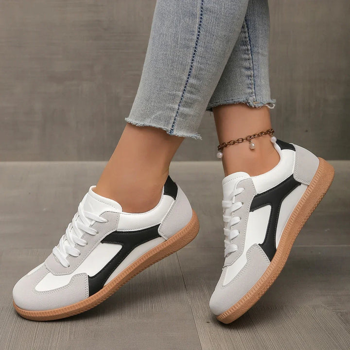 Retro-inspired women's casual sneakers, low profile design, cushioned for long-lasting comfort with a gum sole.