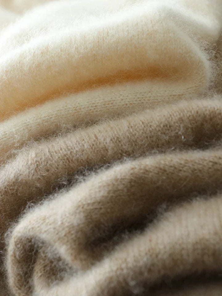 A sophisticated women's top, the Luxe Cashmere Knit Crossover Sweater, ideal for cold weather style