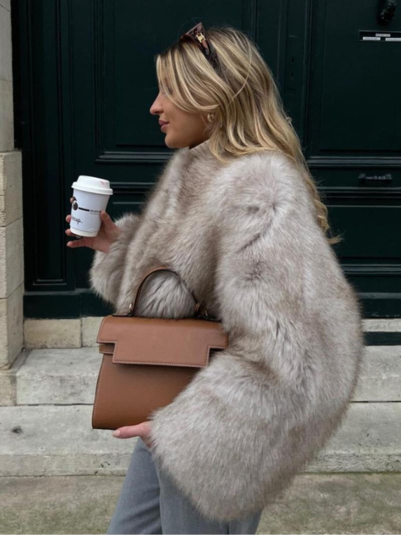 Women's voluminous faux fur jacket, plush and elegant, ideal luxury winter coat