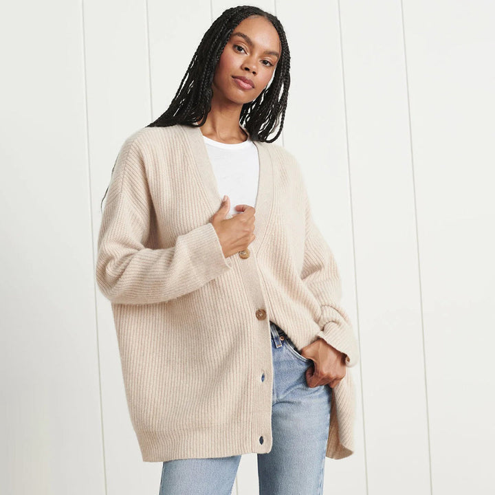 Cozy women's oversized cardigan, a versatile outerwear piece for stylish comfort.