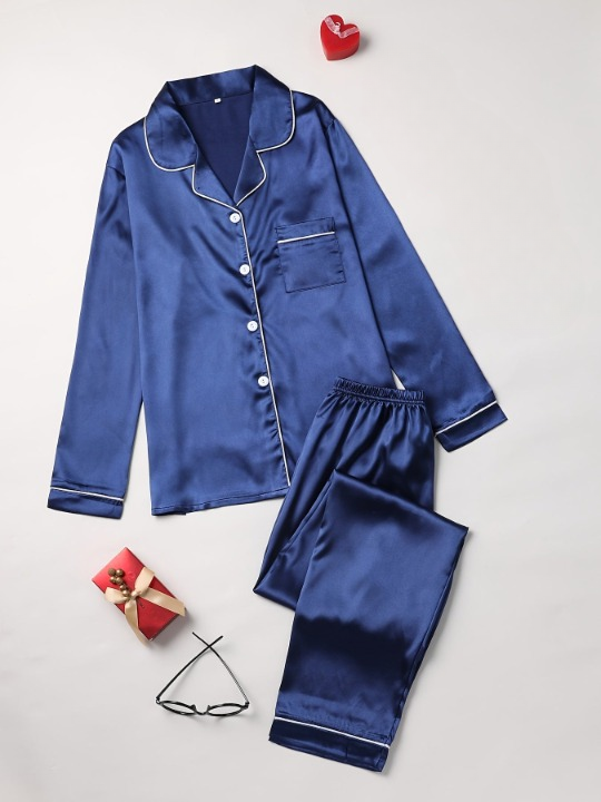 Luxurious women's silk loungewear set. Two-piece pajamas for sophisticated relaxation.
