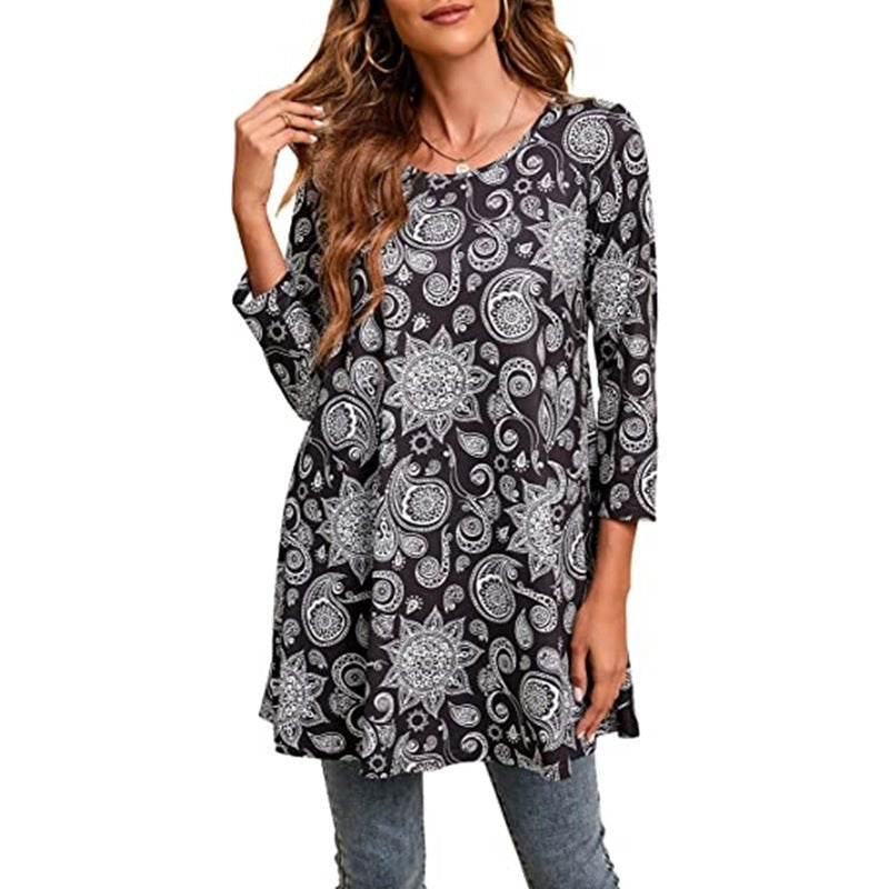Women's Mandala Print Swing Tunic Top with three-quarter sleeves. Boho chic, relaxed fit for summer casual wear.