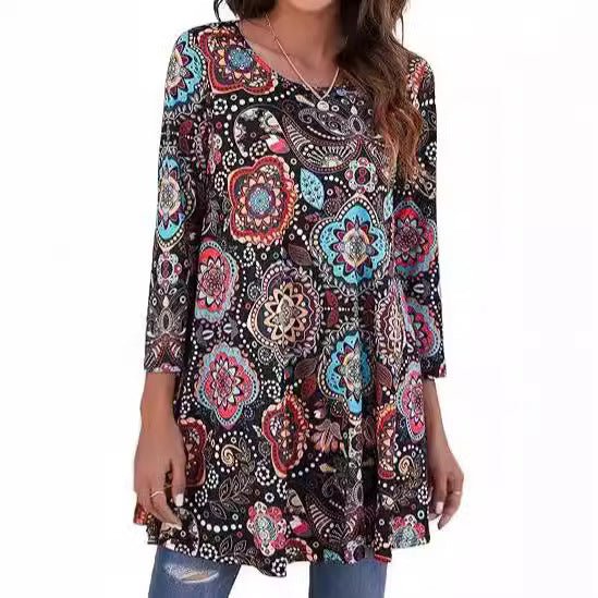 Woman wearing a versatile Mandala Print Swing Tunic Top with jeans. Effortless, relaxed fit for everyday casual style.