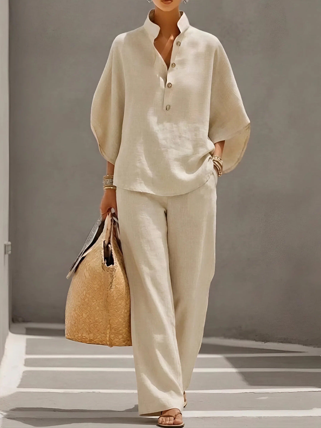 Full view of women's elegant two-piece pant set: Mandarin collar kimono top & flattering wide-leg pants.