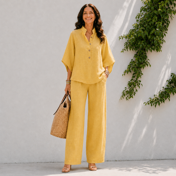 Matching women's set: a stylish oversized blouse paired with comfortable wide-leg pants for easy wear.