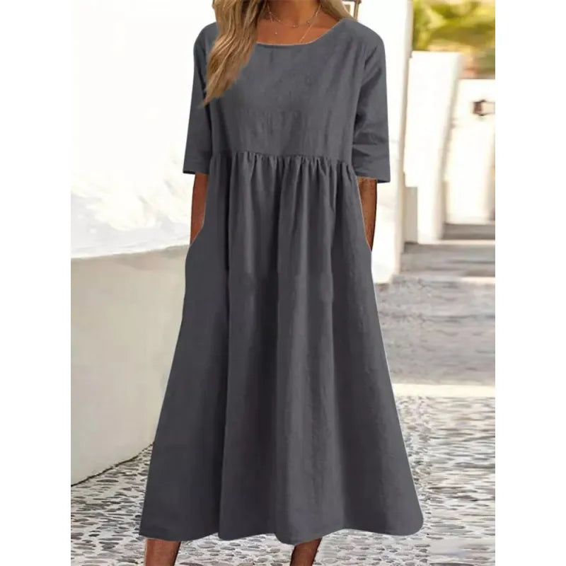 Effortless women's summer maxi dress with half-sleeves and handy pockets.