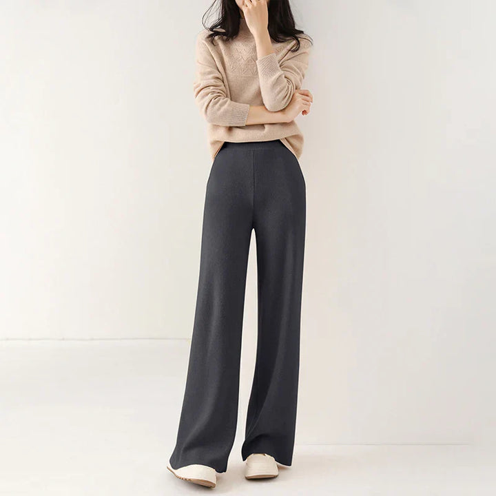 Side view of women's merino wool wide-leg lounge pants, emphasizing the flowing wide-leg design