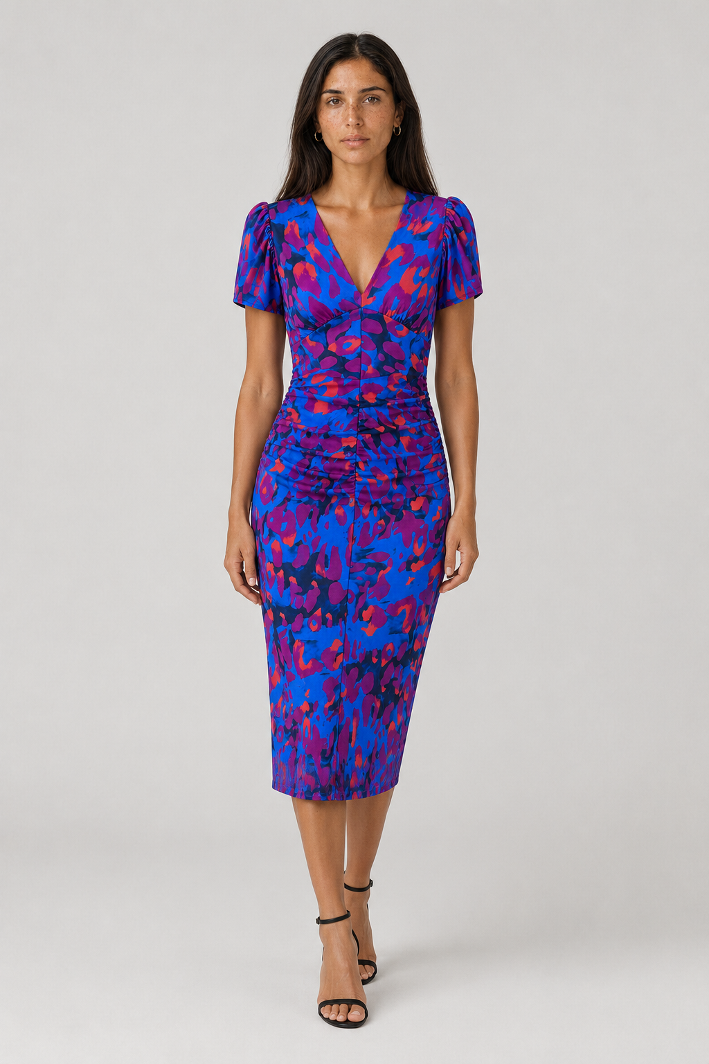Women's midi dress with puff sleeves, gathered waist, and colorful abstract print. Elegant V-neck summer dress.