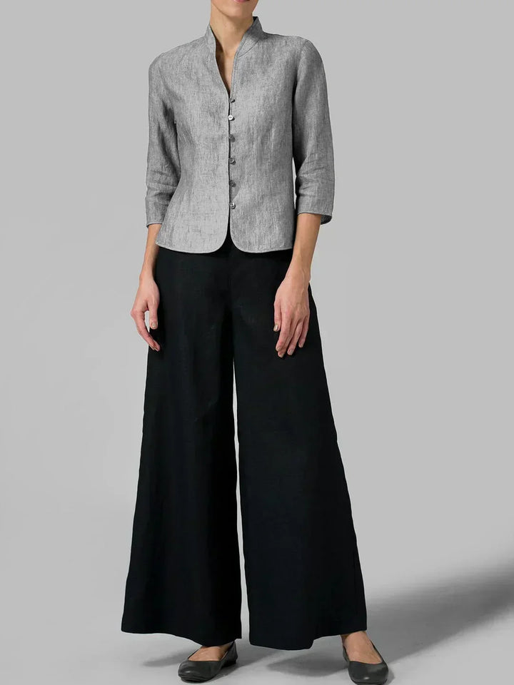 Stylish women's minimalist top with button front, 3/4 sleeves. Relaxed fit blouse for versatile everyday apparel.