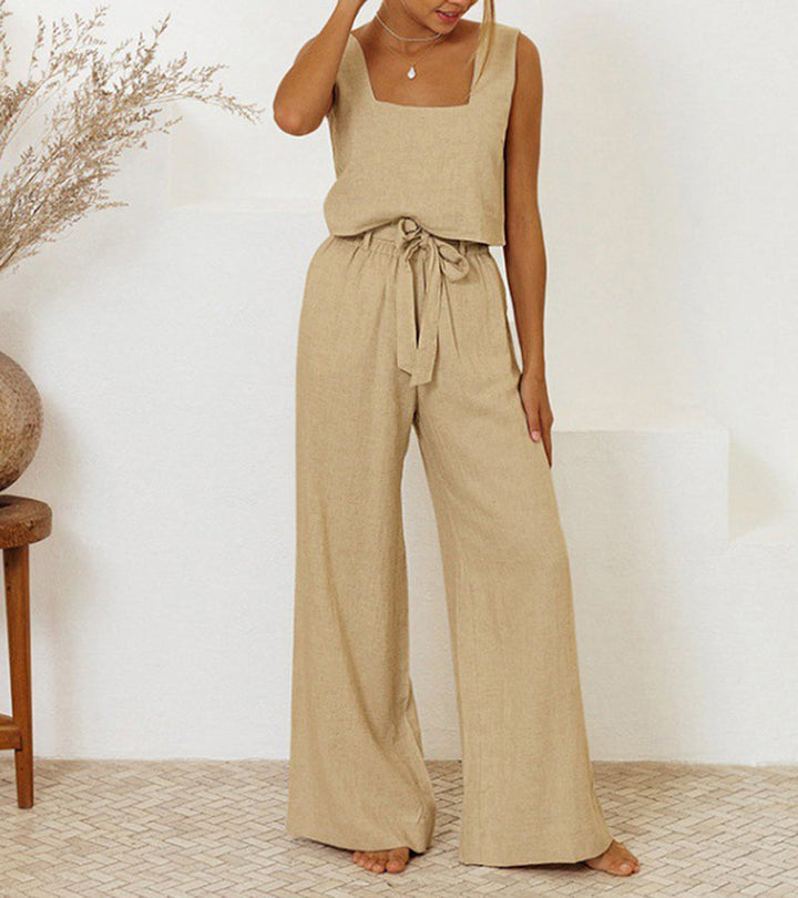 Women's minimalist two-piece set featuring a chic top and wide-leg pants. Perfect for casual elegance & modern style.