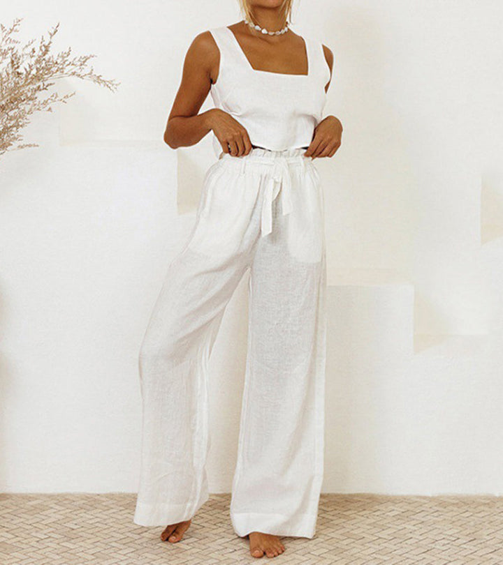 Comfy women's matching set: minimalist top & wide-leg pants. Versatile for spring/summer, offers casual elegance.