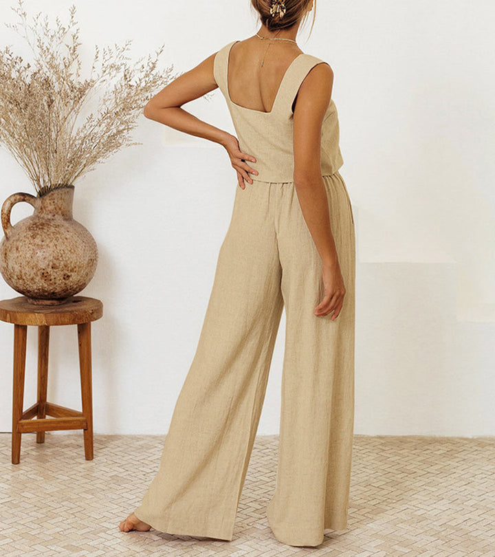 Modern women's minimalist two-piece for spring/summer. Features a chic top and comfortable wide-leg pants. Casual.