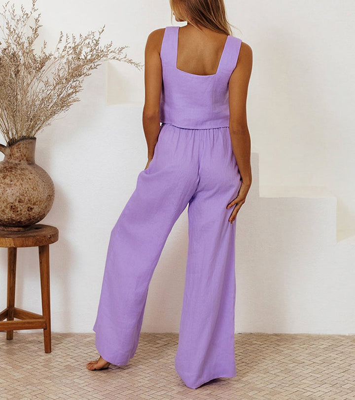 Relaxed yet chic women's two-piece: minimalist top & wide-leg pants. Perfect for everyday casual elegance and comfort.