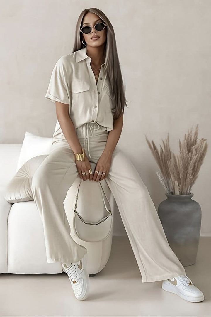 Women's minimalist two-piece set, ideal for casual chic or elegant loungewear. Perfect coordinated outfit.