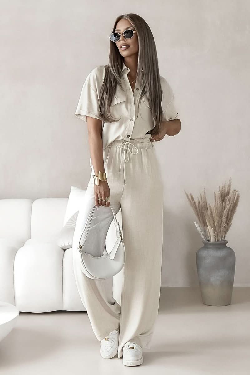 Chic women's coordinated two-piece set for versatile spring summer wear. Minimalist matching outfit.