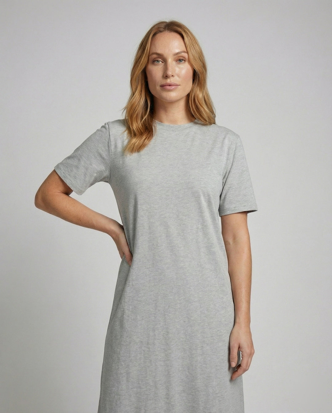 Comfortable A-line women's maxi dress. Features a mock neck, short sleeves & a chic side split. Versatile style.