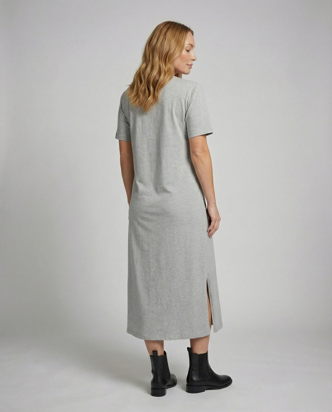 Casual women's short sleeve mock neck maxi dress. Perfect for everyday wear, featuring a flattering side split.