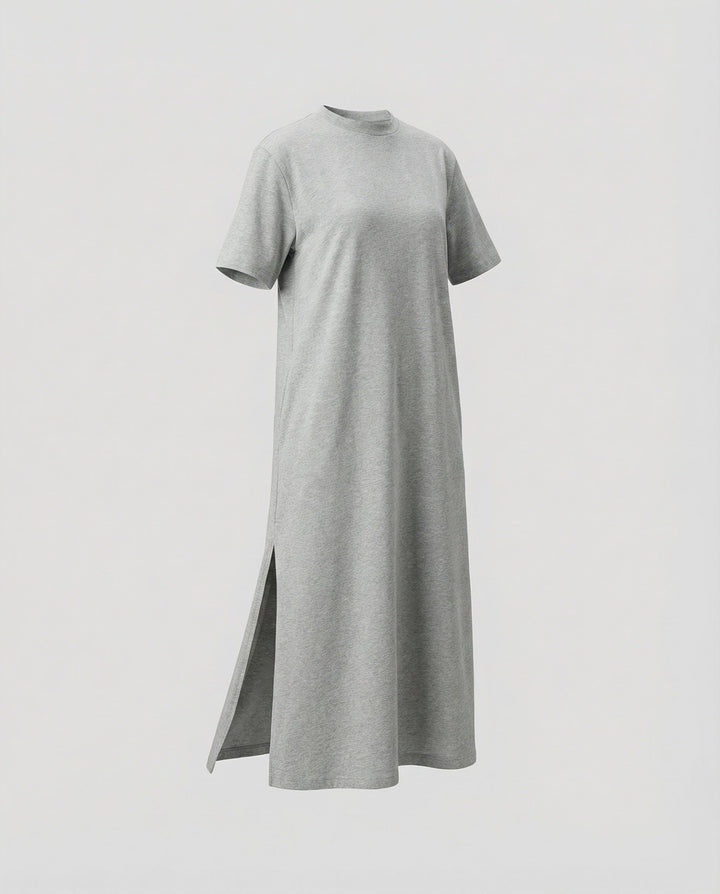 Minimalist women's maxi dress with mock neck, short sleeves, and elegant side split. Great for summer fashion.