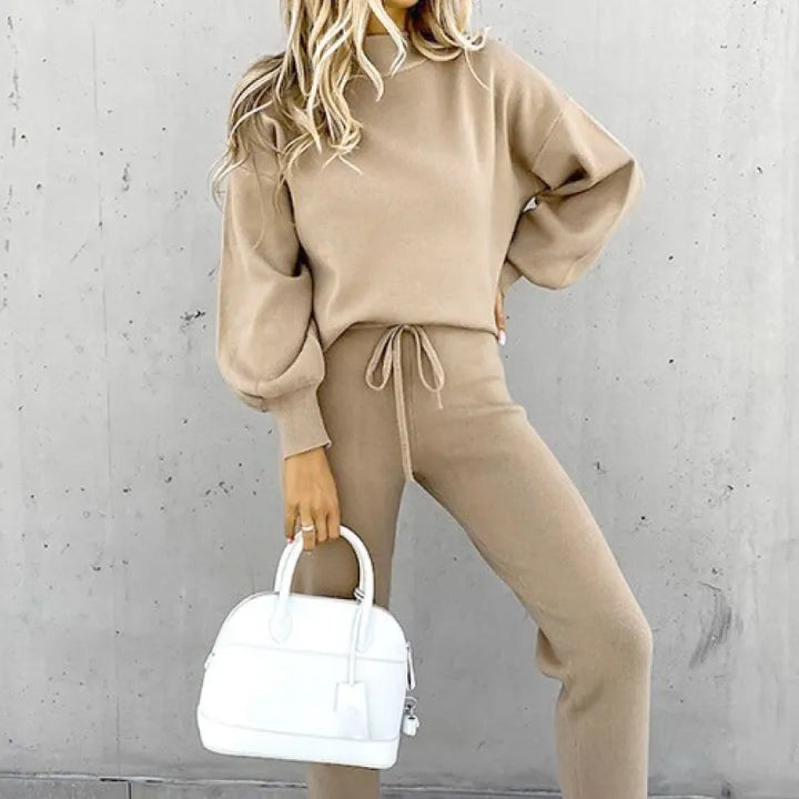 Stylish women's matching set: mock neck top & drawstring pants, ideal for comfortable wear.