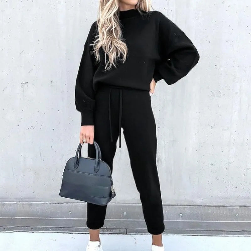 Casual women's mock neck two-piece loungewear set with balloon sleeves and drawstring pants.
