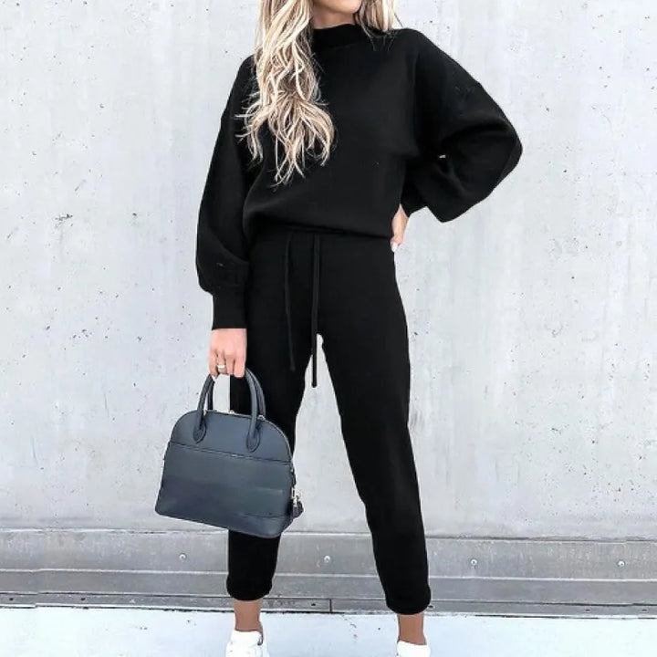 Casual women's mock neck two-piece loungewear set with balloon sleeves and drawstring pants.