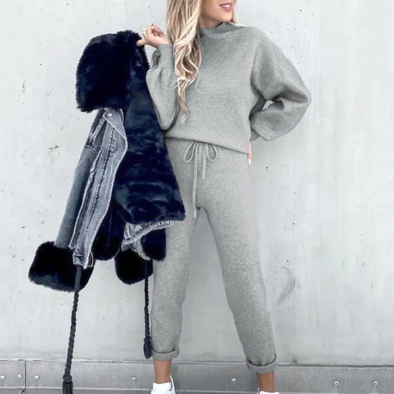 Comfortable women's mock neck set, featuring drawstring pants and a relaxed fit.