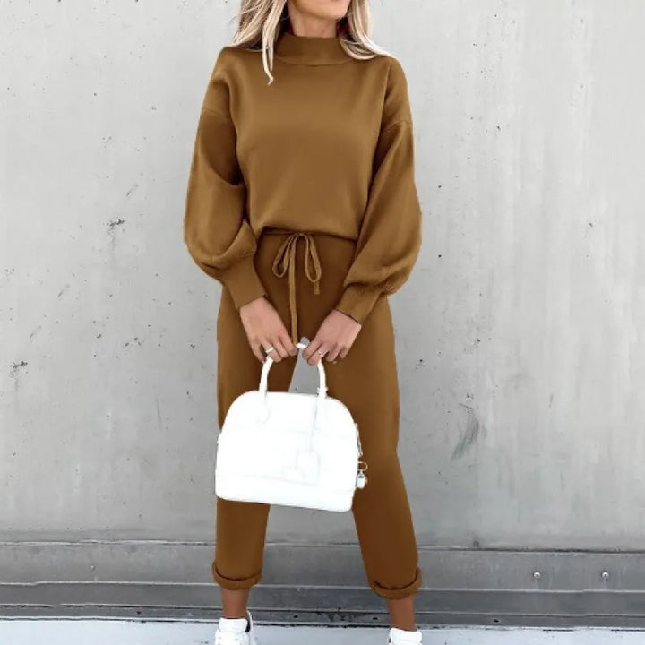 Women's matching loungewear set with a mock neck top and adjustable drawstring pants.