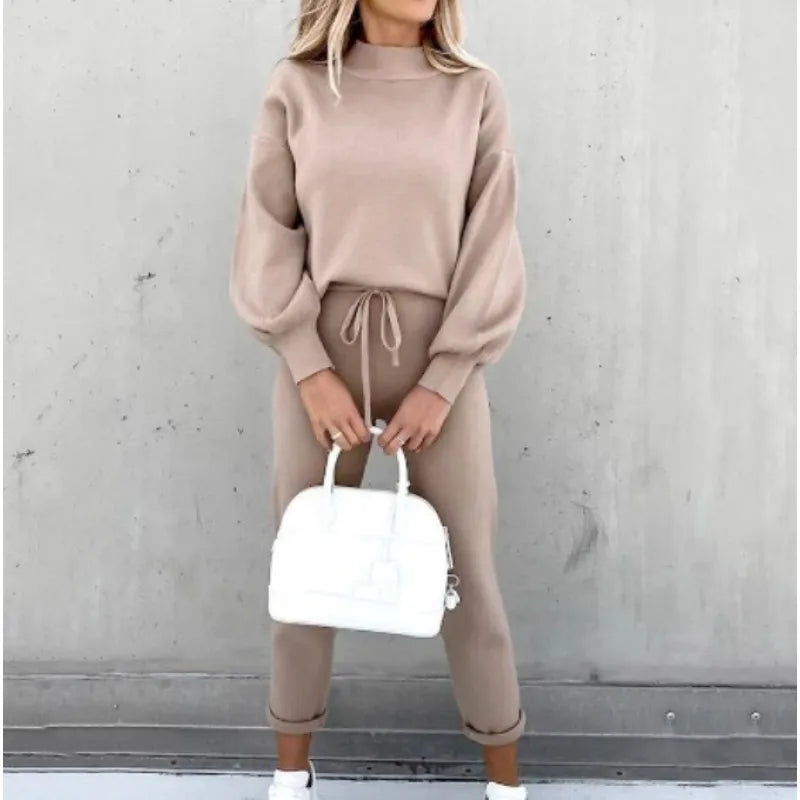 Relaxed women's mock neck top and drawstring pants matching set, perfect for home or outings.
