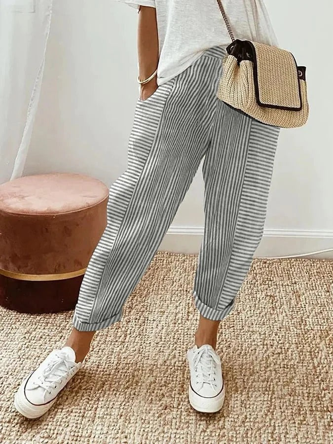 Striped women's casual trousers featuring a straight leg & comfortable elastic waist.