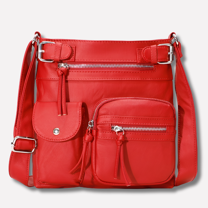 Red women's stylish multi-pocket crossbody handbag with adjustable strap for organized style.