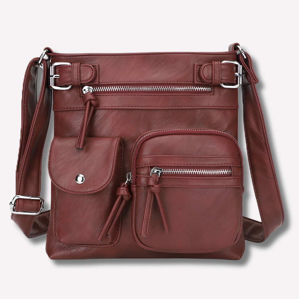 Women's everyday crossbody bag featuring multiple pockets & adjustable strap for organized style.