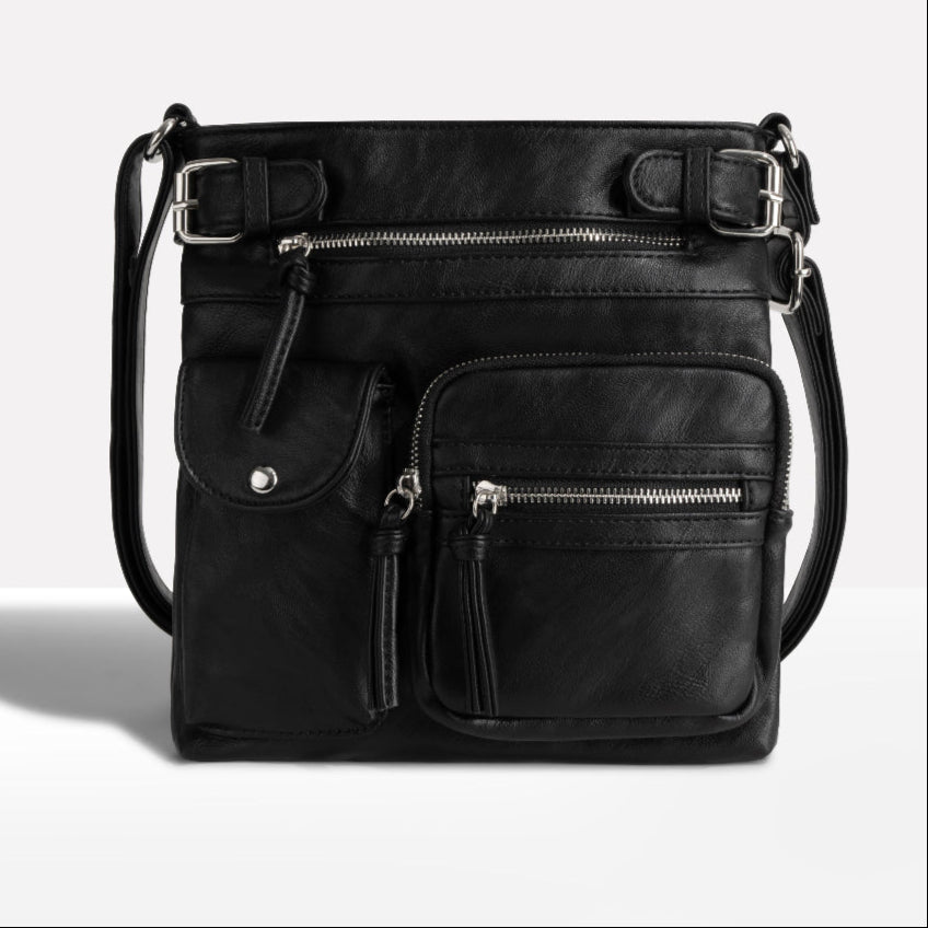 Adjustable strap women's crossbody bag with practical multi-pocket design for easy organization.