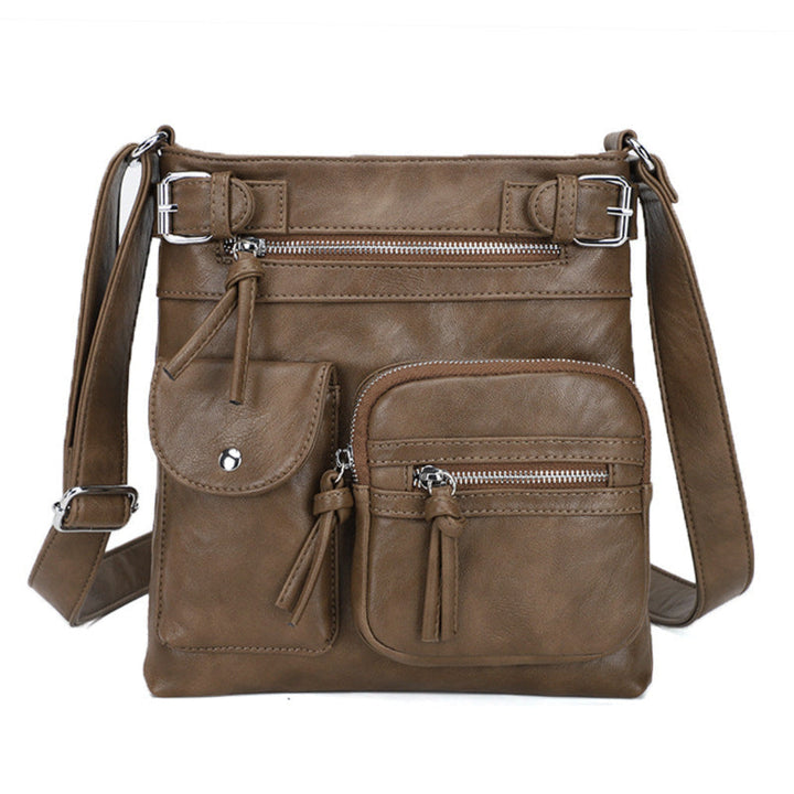 Fashionable women's crossbody bag, compact with multiple pockets for organized, stylish carry.