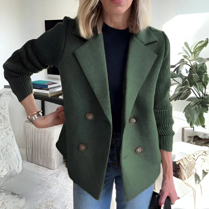Model posing in a women's knit blazer, illustrating its comfortable jacket design and smart casual appeal.