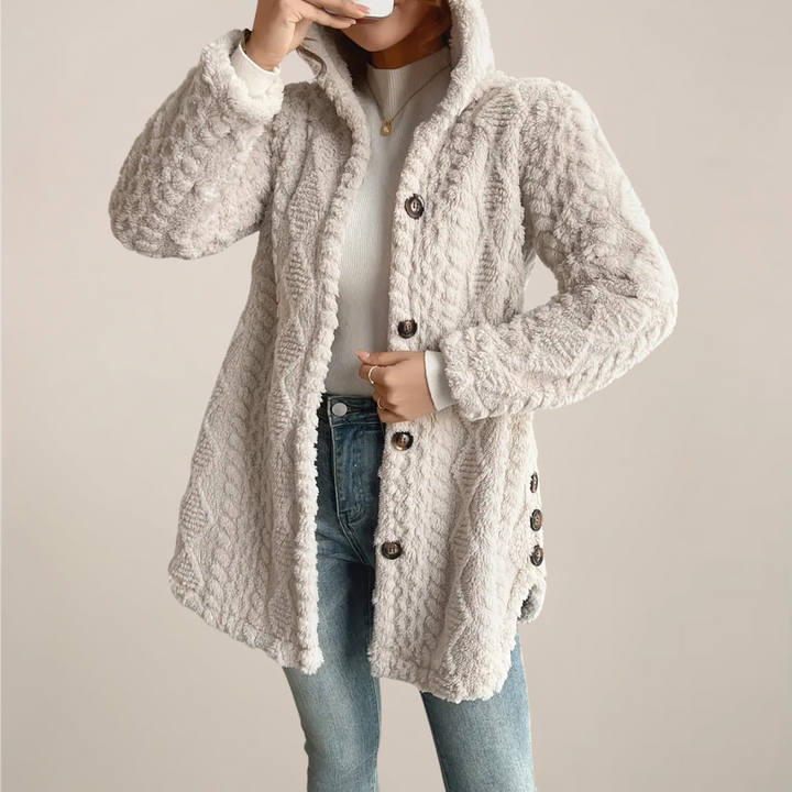 Lightweight women's hooded cardigan in a textured knit, a chic spring layering piece