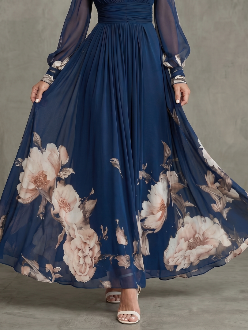 Chic back view of a women's navy V-neck pleated maxi dress with delicate sheer long sleeves, ideal for occasions.